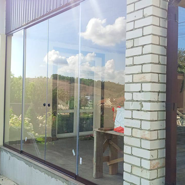 Панорамное безрамное остекление террасы